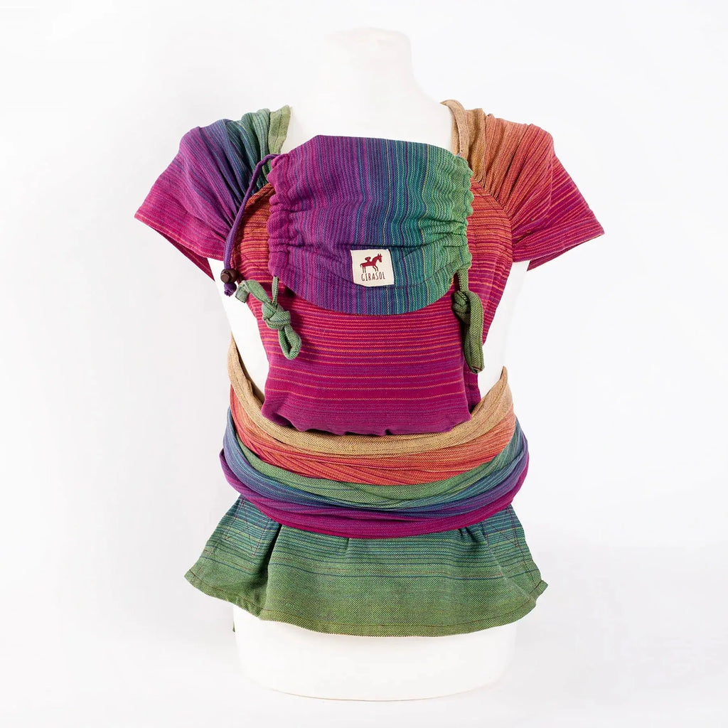 Girasol WrapMySol Paradise front view on mannequin — rainbow stripe handwoven Guatemala cotton Mei Tai Meh Dai

