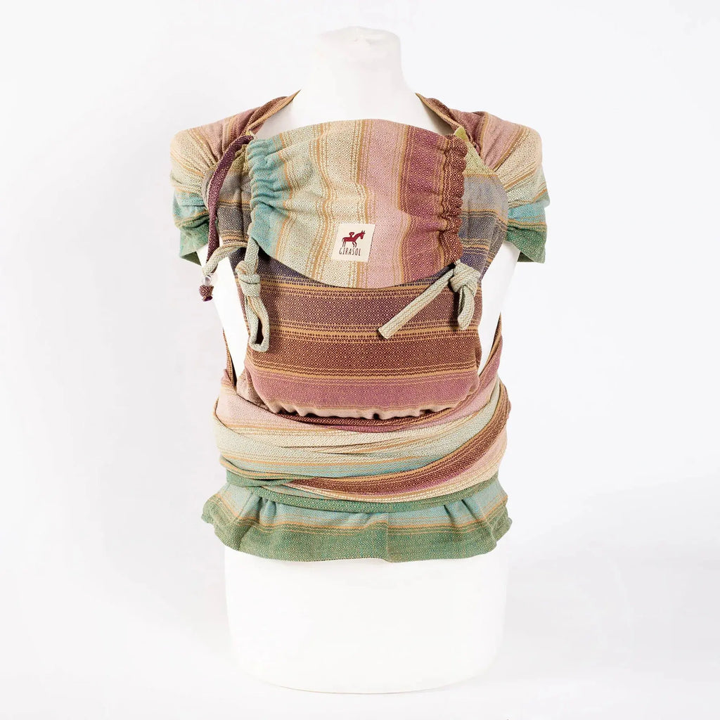 Girasol WrapMySol Rayos D'Oro mannequin display — gold amber handwoven Guatemala cotton Mei Tai half buckle