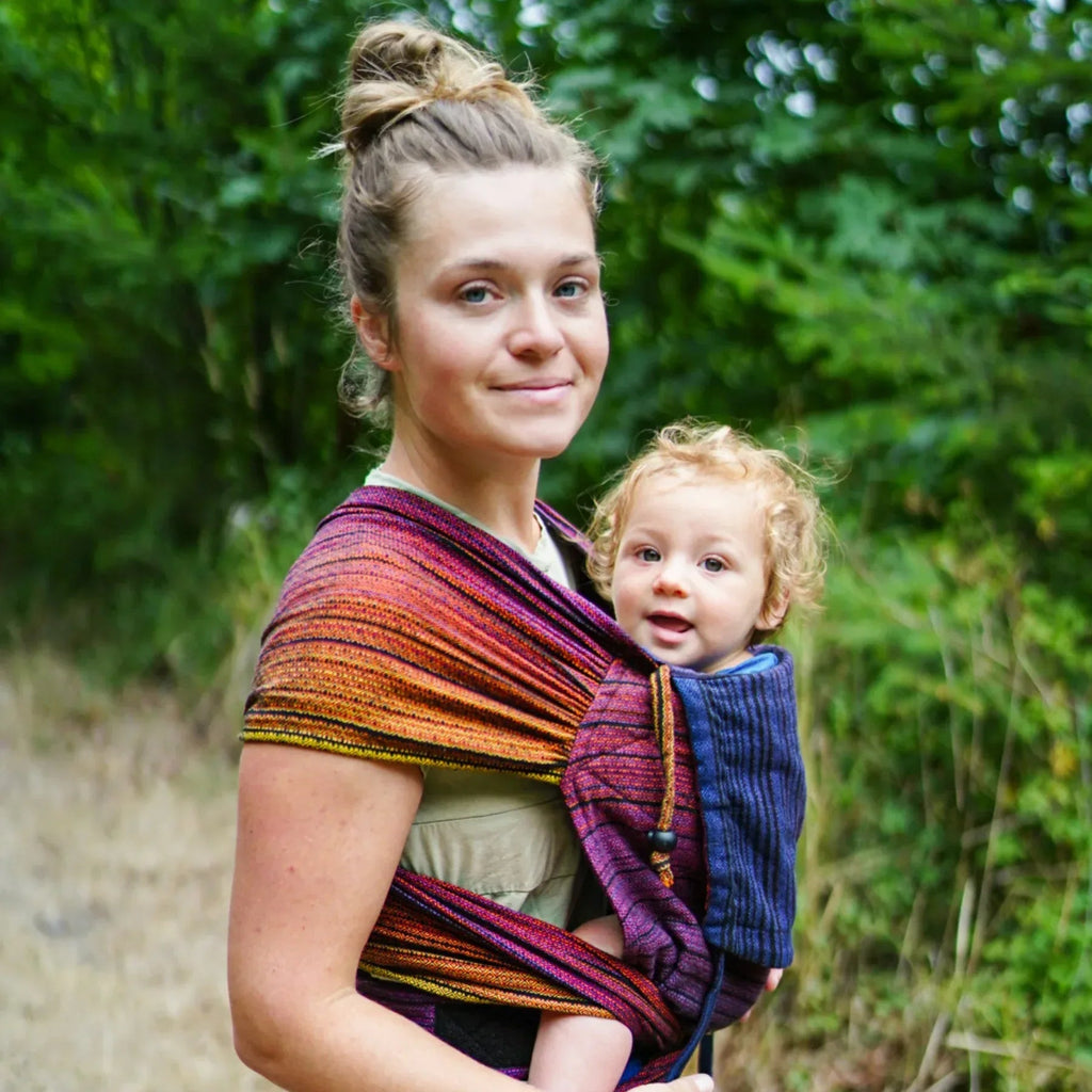 Girasol WrapMySol Twilight displayed on mannequin — dark navy purple diamond weave half buckle carrier

